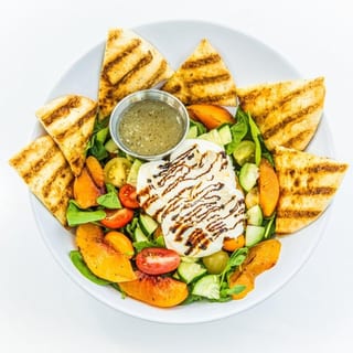 heirloom tomato burrata salad w/fire-grilled peach (veg)